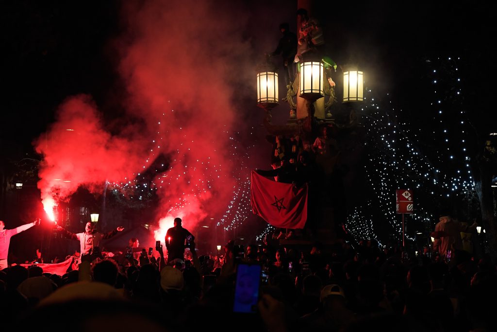 Morocco's supporters celebrate their victory vs Spain after the Qatar 2022 World Cup football - Barcelona 2022